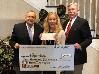 Paul Marotta Elizabeth St Pierre and David Sprague holding Fisher House big check