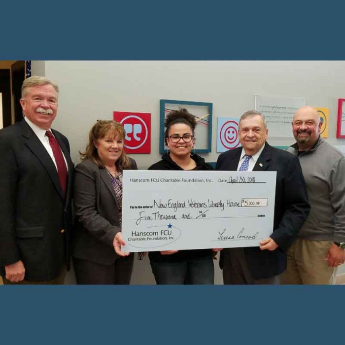 President and CEO David Sprague Hanscom FCU Chairwoman Teresa Conrad Hanscom FCU Charitable Foundation Program Manager Islean Carrillo New England Veterans Liberty House Chairman of the Board Paul Marotta Hanscom FCU and Director John Delcore Hanscom FCU