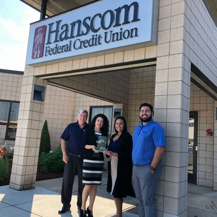 Hanscom FCU partner relations team with their Designation of Savings Excellence Award