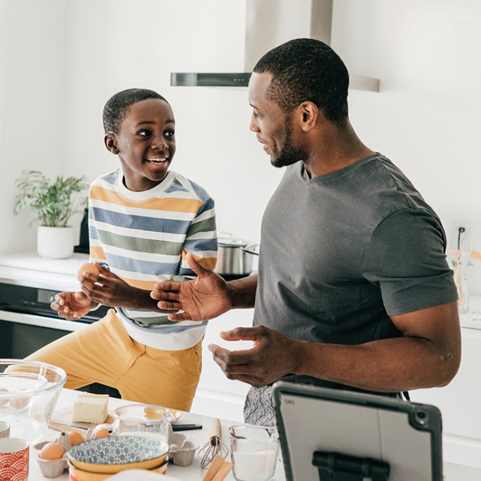 father son in kitchen