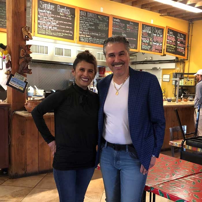 Dalia and Oscar Garcia in front of Oscar's Burritos Mexican Grill