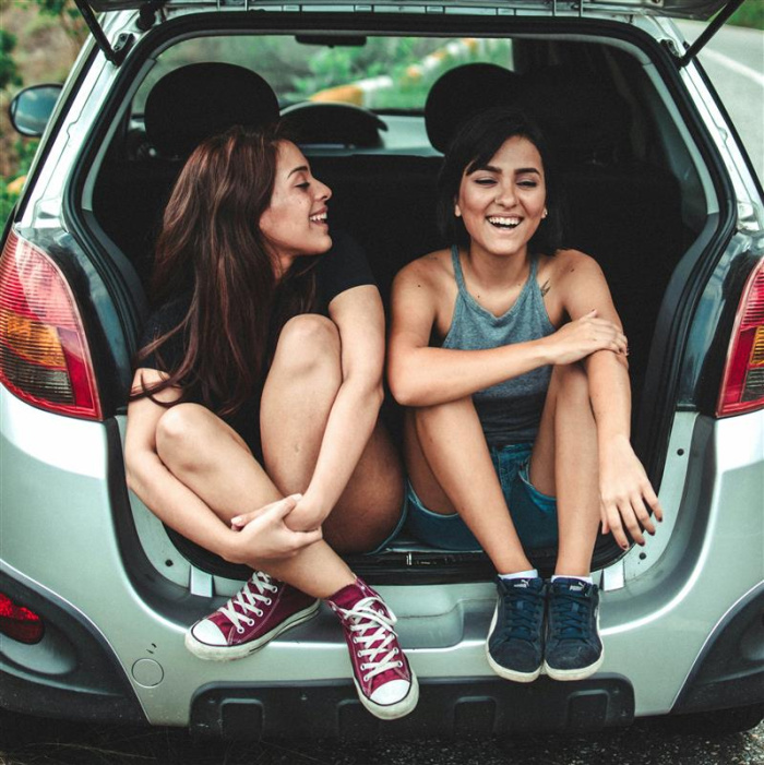 women in van trunk