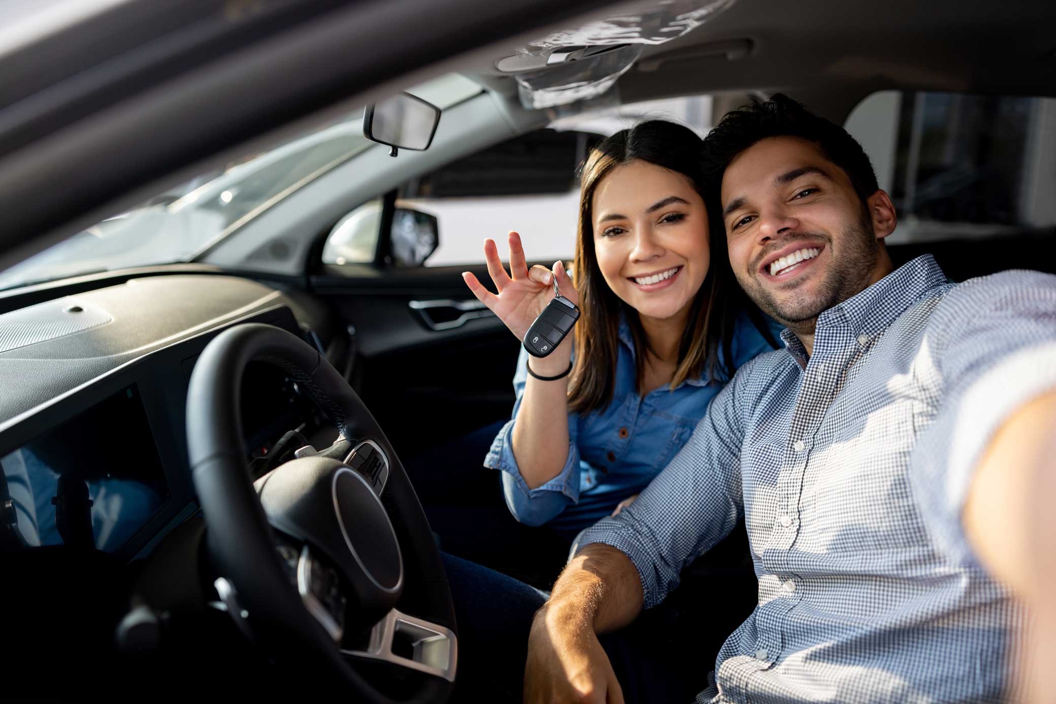 a couple inside a car