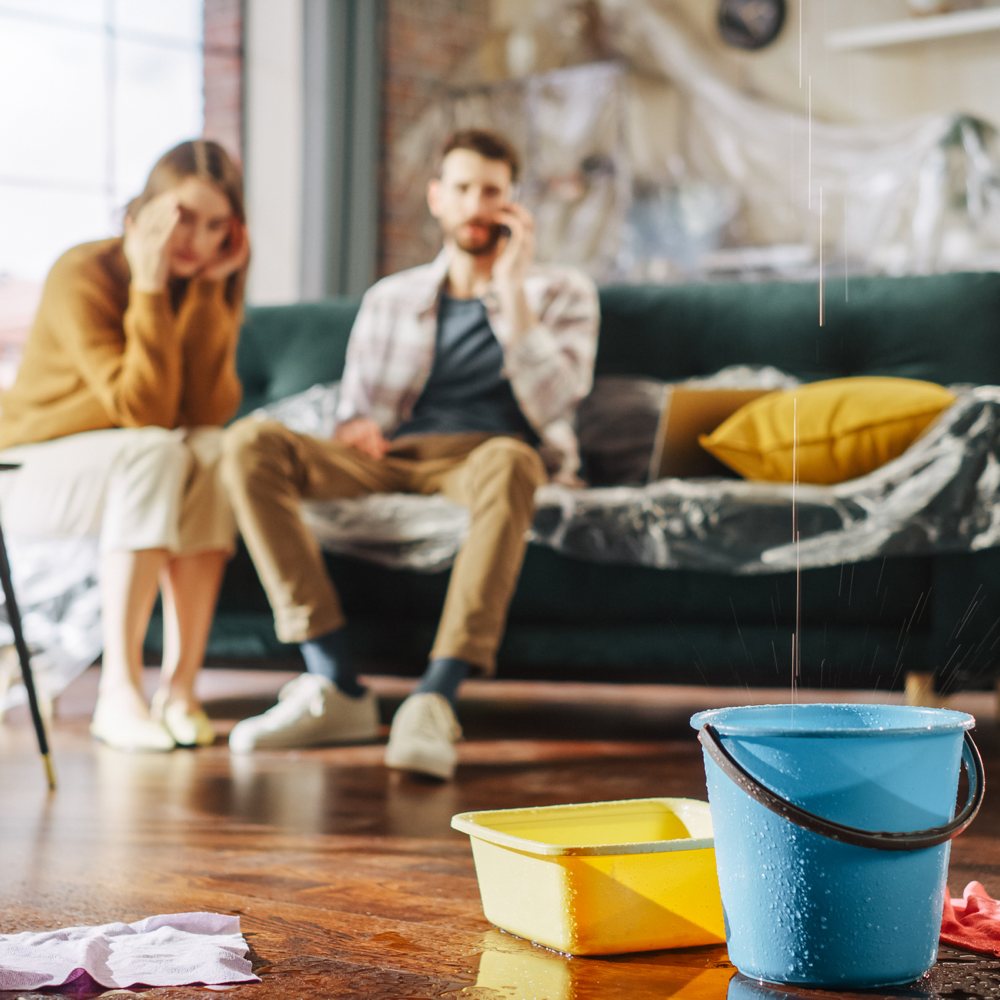 the ceiling is leaking into a bucket